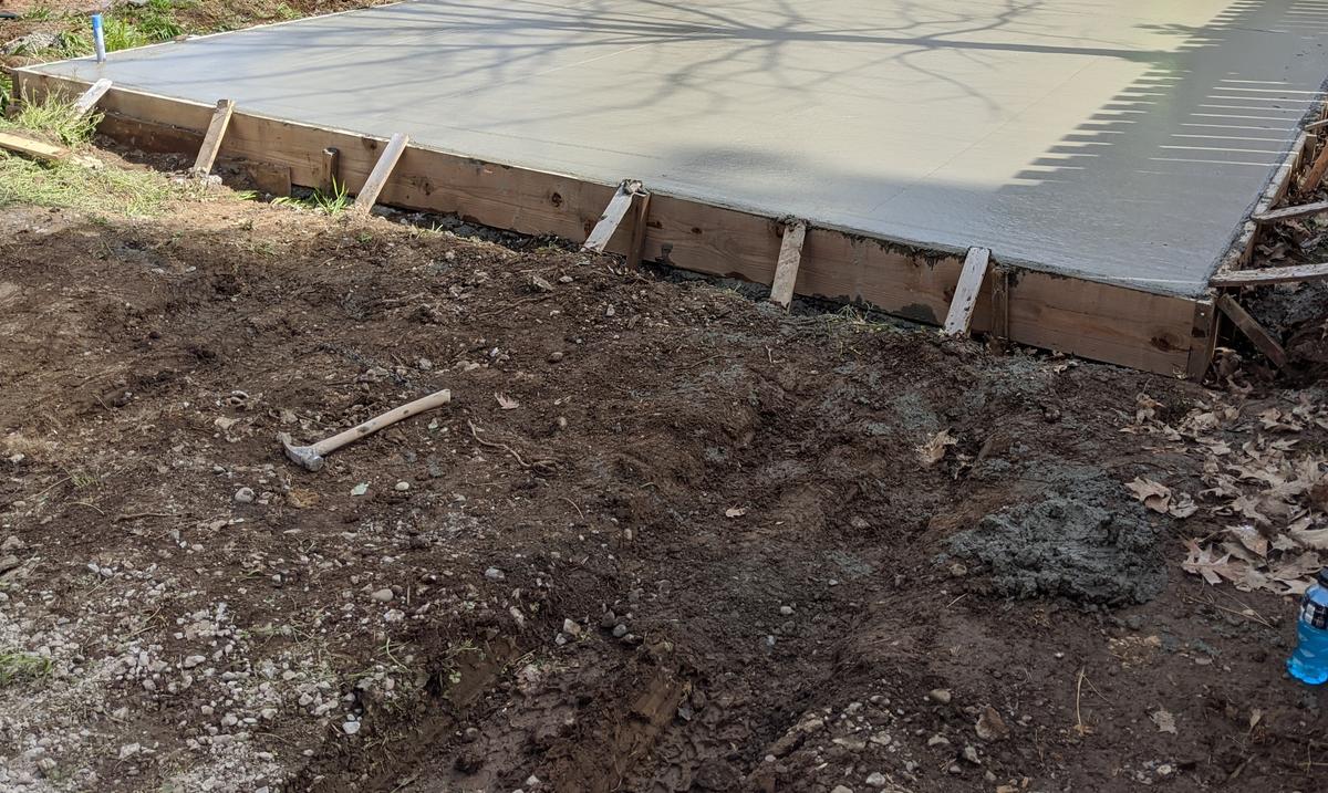 Freshly poured concrete slab for a detached garage