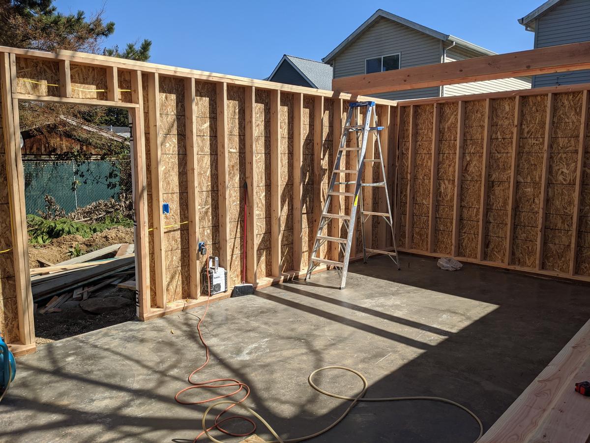 Detached garage wall framing on a new concrete slab