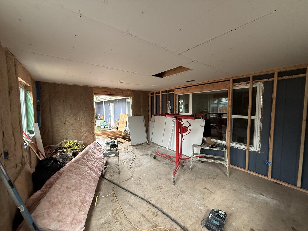 Insulated walls and drywall lift ready for drywall in a Portland addition