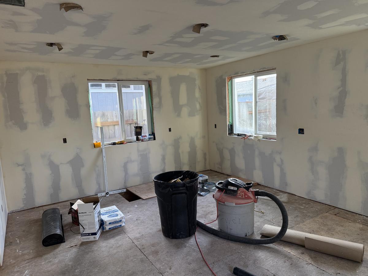 Drywall taped and mudded in a Portland home addition