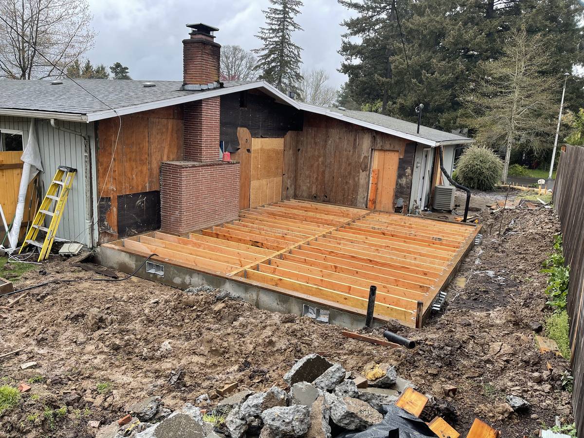 Floor joist framing on a new foundation for a Portland house addition